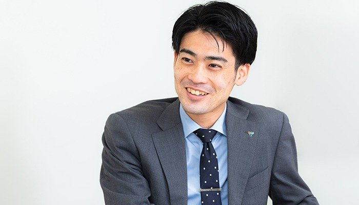 木暮に問いかける平井