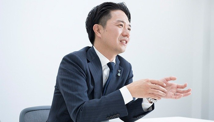 産業ソリューション事業部設立の狙いを話す早津